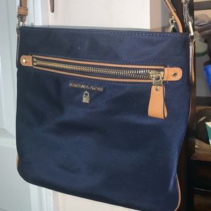 Micheal Kors purse navy blue some wear, easy to clean good condition make offer!